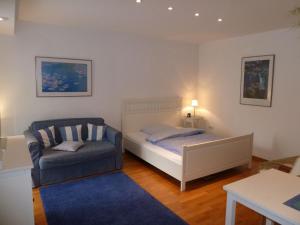 Ένα ή περισσότερα κρεβάτια σε δωμάτιο στο Ferienwohnung Dora Brand