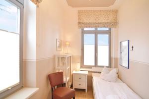 Ein Bett oder Betten in einem Zimmer der Unterkunft Villa Schering App. EG links