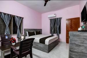 Voodi või voodid majutusasutuse Hotel Pink Tree Near KIIT University toas