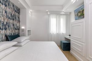 Postel nebo postele na pokoji v ubytování Maison Dorotea