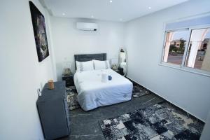 Postel nebo postele na pokoji v ubytování Villa Bonsai Marrakech + 50 fotografií