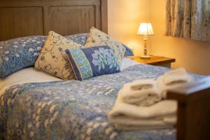 Ένα ή περισσότερα κρεβάτια σε δωμάτιο στο Stable Cottage