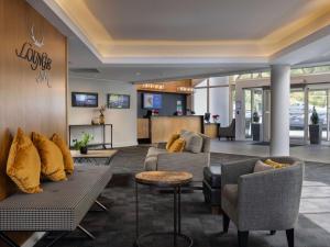 TV a/nebo společenská místnost v ubytování Mercure Queenstown Resort