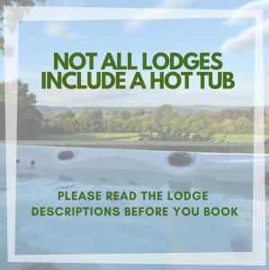 a sign on the window of a bus with the words not all lobes include at North Wales Eco Lodges in Ruthin