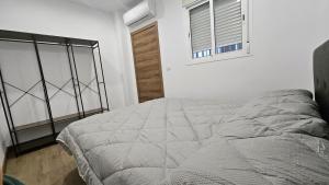 En eller flere senge i et værelse på Optimus Guadalquivir + 22 billeder