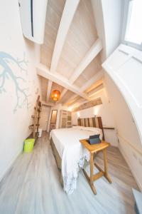 Postel nebo postele na pokoji v ubytování B&B Terra - Stanza Natura