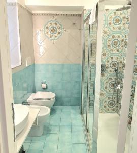 a bathroom with a toilet and a sink and a shower at Villa Blu Costiera in Amalfi +48 photos