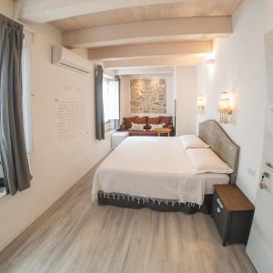 Postel nebo postele na pokoji v ubytování B&B Terra - Stanza Poesia