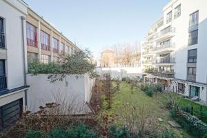 サン・トゥアンにあるParking, balcon, vue jardin à 5 minutes du metroのアパートの空き地
