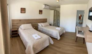 Postel nebo postele na pokoji v ubytování Casa Parral Hostal