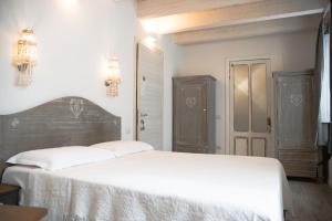Postel nebo postele na pokoji v ubytování B&B Terra - Stanza Poesia