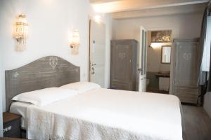 Postel nebo postele na pokoji v ubytování B&B Terra - Stanza Poesia