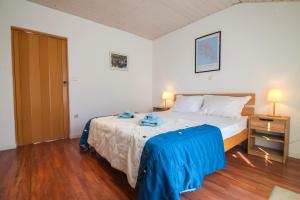 Posteľ alebo postele v izbe v ubytovaní Helvetia Sunny Apartments