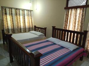 Ένα ή περισσότερα κρεβάτια σε δωμάτιο στο Matara Browns Peak