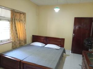 Ένα ή περισσότερα κρεβάτια σε δωμάτιο στο Matara Browns Peak +2 φωτογραφίες