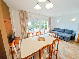 A seating area at LITORAL COSTA DORADA - LAS CUMBRES Only families