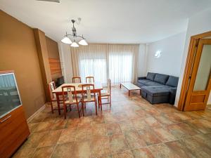 A seating area at LITORAL COSTA DORADA - LAS CUMBRES Only families