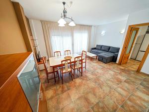 A seating area at LITORAL COSTA DORADA - LAS CUMBRES Only families