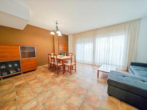 A seating area at LITORAL COSTA DORADA - LAS CUMBRES Only families