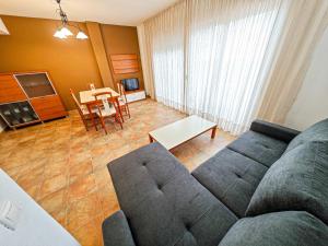 A seating area at LITORAL COSTA DORADA - LAS CUMBRES Only families