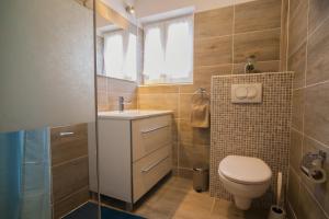 Kúpeľňa v ubytovaní Helvetia Sunny Apartments