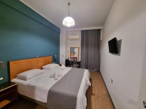 Postel nebo postele na pokoji v ubytování Savoy Hotel + 37 fotografií