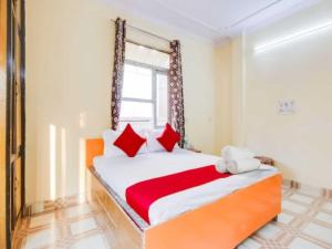 Voodi või voodid majutusasutuse Hotel O Smart View toas