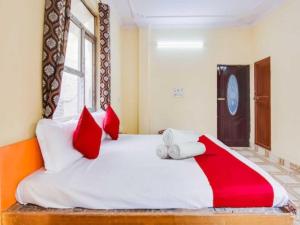 Voodi või voodid majutusasutuse Hotel O Smart View toas