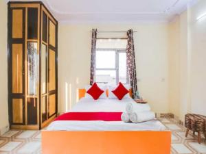 Voodi või voodid majutusasutuse Hotel O Smart View toas