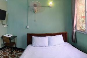 Postel nebo postele na pokoji v ubytování Golden Home Guesthouse