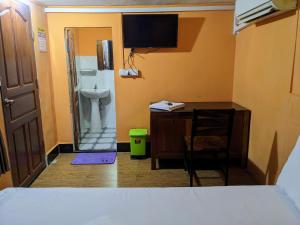 Kuchyň nebo kuchyňský kout v ubytování Golden Home Guesthouse