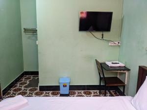 TV a/nebo společenská místnost v ubytování Golden Home Guesthouse