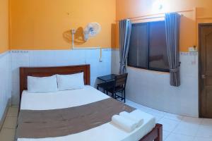 Postel nebo postele na pokoji v ubytování Golden Home Guesthouse