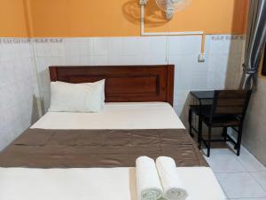 Postel nebo postele na pokoji v ubytování Golden Home Guesthouse