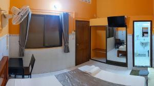 Postel nebo postele na pokoji v ubytování Golden Home Guesthouse