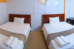 Postel nebo postele na pokoji v ubytování Golden Home Guesthouse