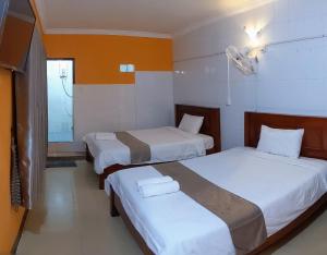 Postel nebo postele na pokoji v ubytování Golden Home Guesthouse