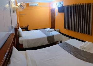 Postel nebo postele na pokoji v ubytování Golden Home Guesthouse