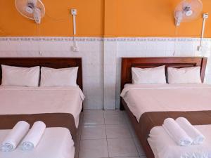 Postel nebo postele na pokoji v ubytování Golden Home Guesthouse
