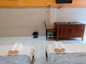 Postel nebo postele na pokoji v ubytování Golden Home Guesthouse