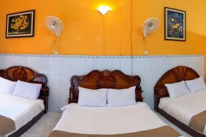 Postel nebo postele na pokoji v ubytování Golden Home Guesthouse