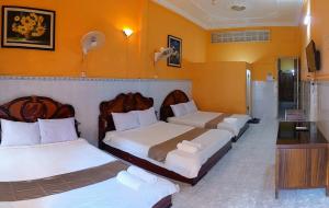 Postel nebo postele na pokoji v ubytování Golden Home Guesthouse