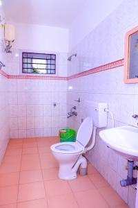 Koupelna v ubytování Vibe inn kodai + 20 fotografií