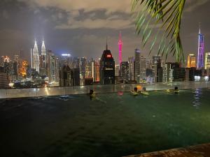 Nespecifikovaný výhled na destinaci Kuala Lumpur nebo výhled na město při pohledu z hostelu