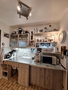 Kuchyň nebo kuchyňský kout v ubytování Appartement Herrlich
