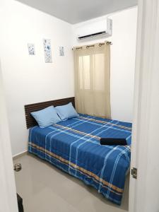 En eller flere senge i et værelse på Casa de Reyes