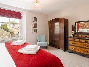 Postel nebo postele na pokoji v ubytování Bellflower Cottage