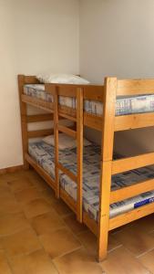 En eller flere senge i et værelse på Gite d'étape Auberge Luna Piena