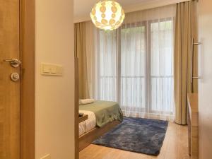 Postel nebo postele na pokoji v ubytování Şişli Of Apartment No 12