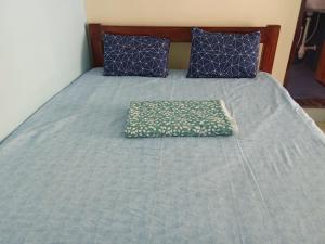 Postel nebo postele na pokoji v ubytování SA Residency